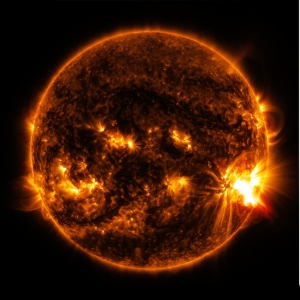 The massive solar flare seen on the right side of the sun erupted on October 27, 2014 from sunspot 12192, the same sunspot seen during the solar eclipse four days earlier. Photo: NASA/SDO