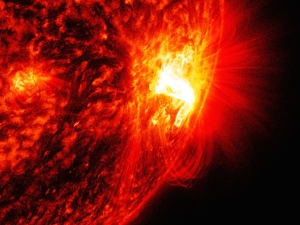 Here is a close-up of the same solar flare. When massive flares are pointing directly at the Earth, major disruptions can occur to satellite communications and the power grid. Photo: NASA/SDO